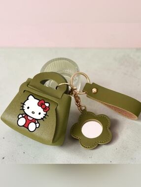 Hello Kitty Portable Mini Coin Purse/Earbud Keychain & Bag Charm